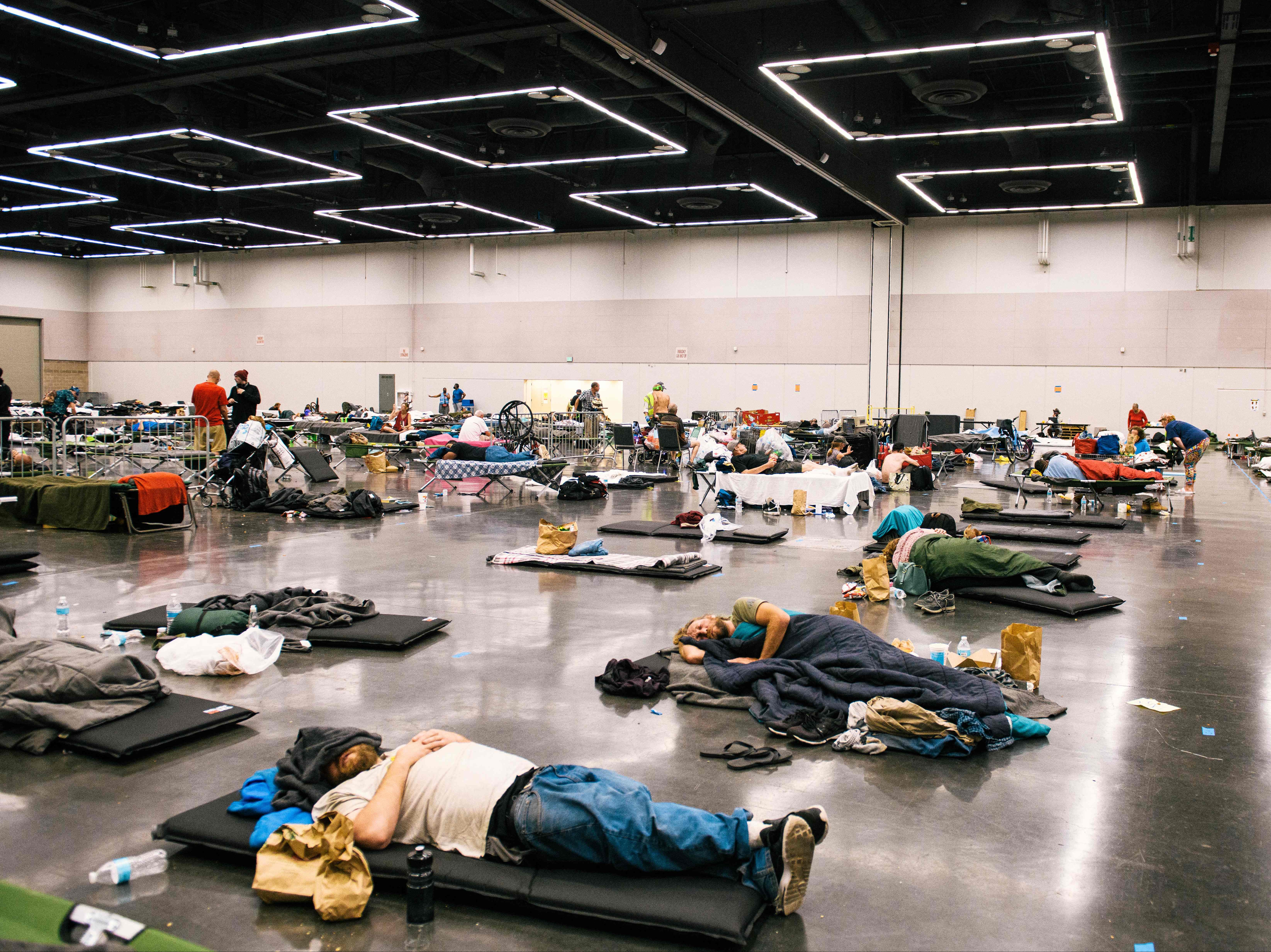 People rest in ‘cooling shelters’ during this year’s record heatwave in North America, which was worsened by the climate crisis