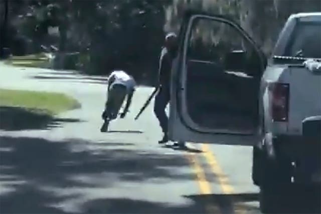 <p>Smartphone footage captured Ahmaud Arbery being shot by Travis McMichael</p>