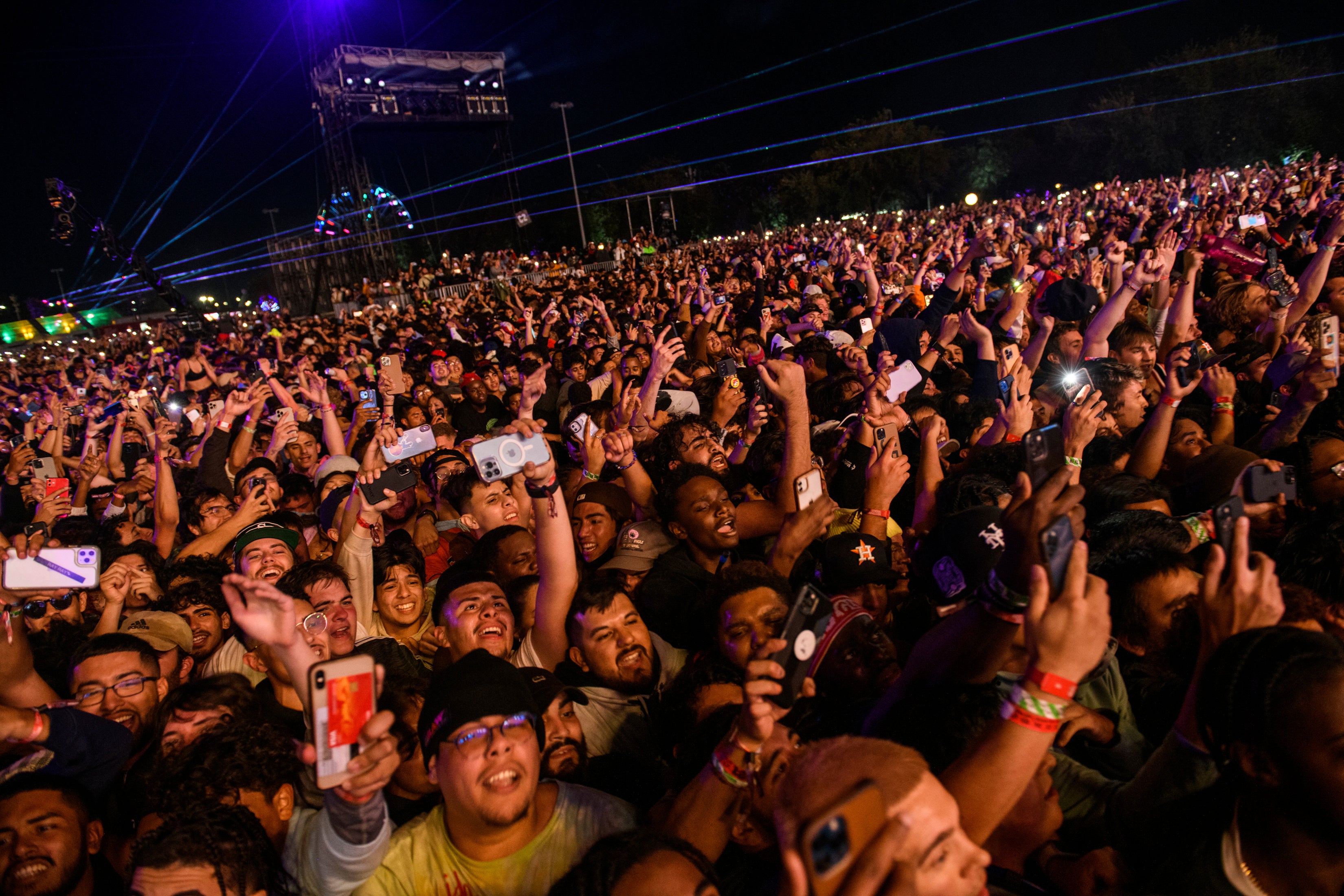 The crowd watches as Travis Scott performs at Astroworld Festival at NRG park on Friday 5 November 2021 in Houston.
