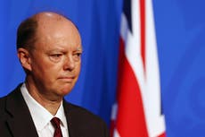 ‘Huge spike’ in Omicron cases risks overwhelming NHS, ministers warn