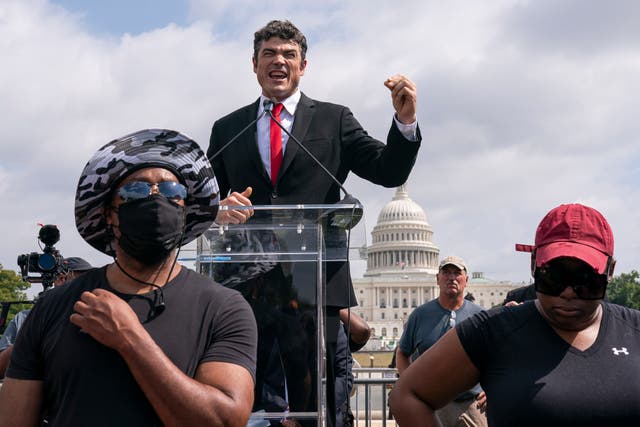 <p>Joe Kent, a GOP challenger to Jaime Herrera Beutler, speaks at a ‘Justice For J6 rally’ near the US Capitol</p>