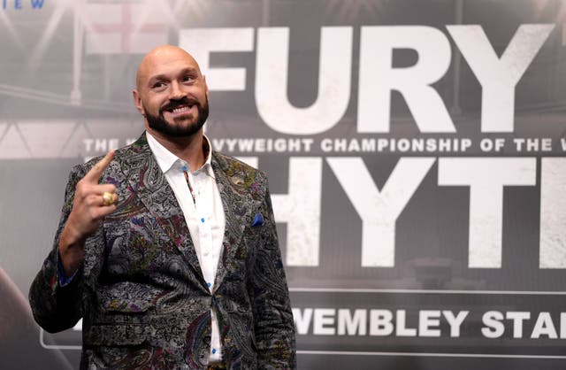 Tyson Fury was not going to let absent ‘friends’ take the shine off his latest moment in the spotlight (John Walton/PA)