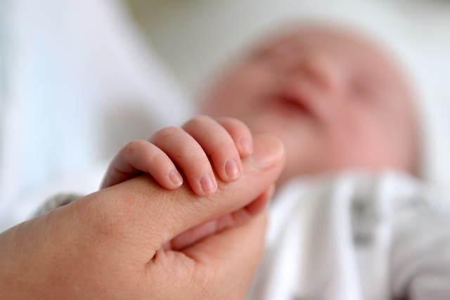 The lives of mothers and babies are being put at risk due to a “severe shortage” of maternity staff (Andrew Matthews/PA)
