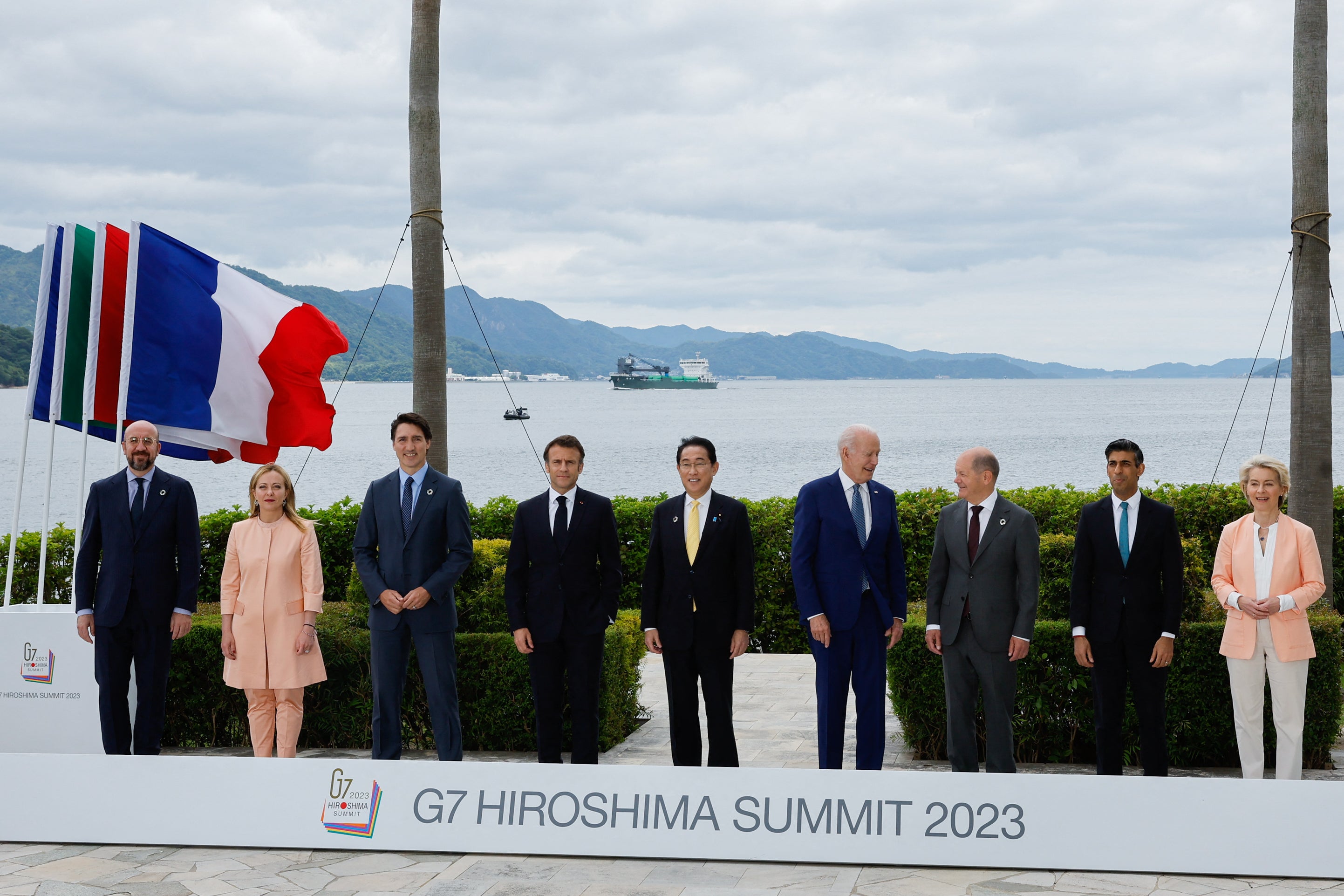 European Council President Charles Michel, Italy's Primer Minister Giorgia Meloni, Canada's Prime Minister Justin Trudeau, France's President Emmanuel Macron, Japan's Prime Minister Fumio Kishida, US President Joe Biden, German Chancellor Olaf Scholz, Britain's Prime Minister Rishi Sunak and European Commission President Ursula von der Leyen participate in a family photo with G7 leaders