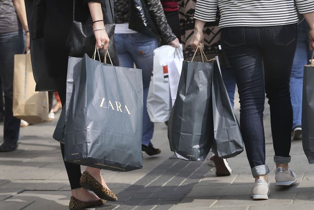 July’s washout weather helped to drive down retail sales (Philip Toscano/PA)