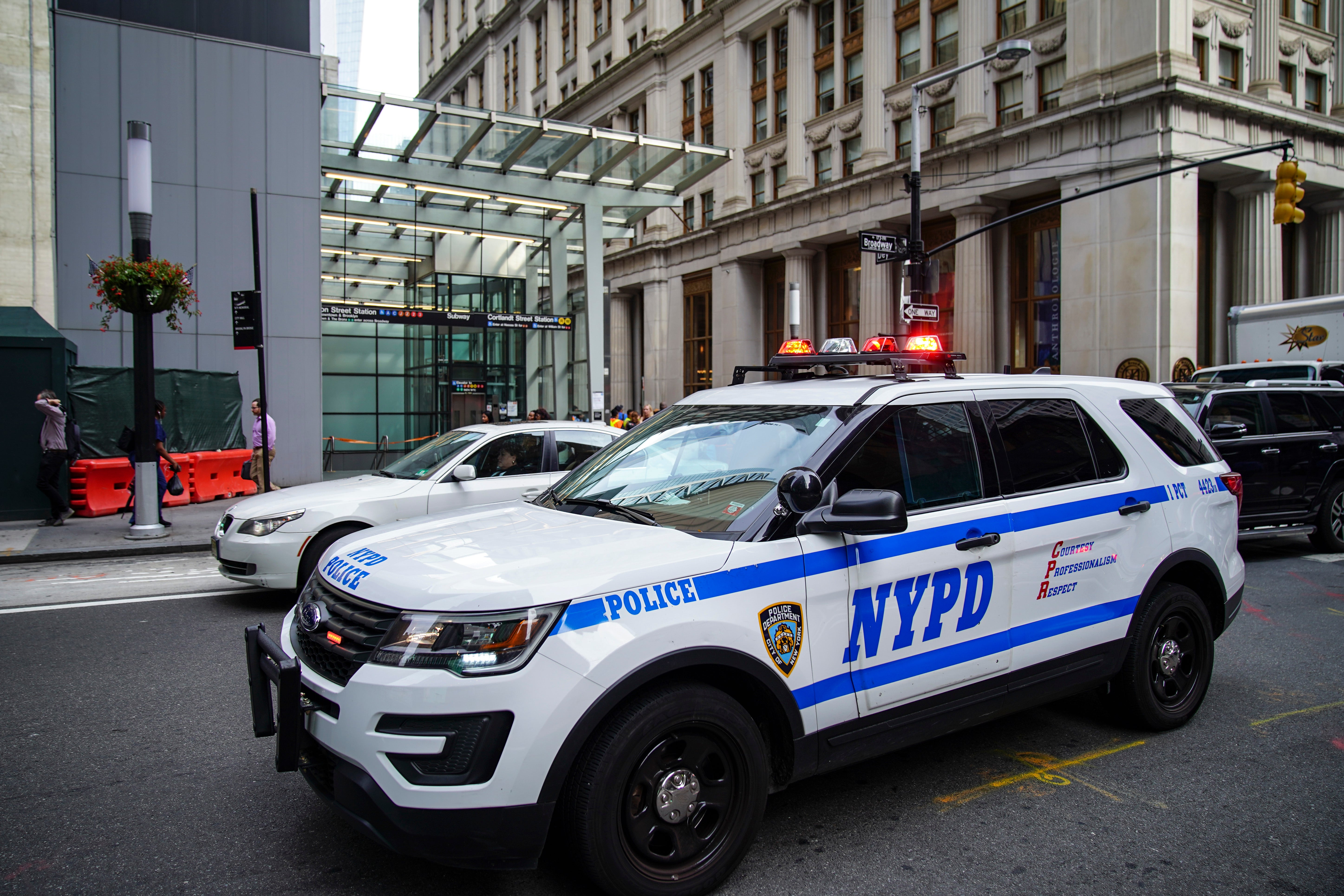 NYPD police vehicles respond near the scene of a suspicious package near the Fulton Street subway station in Lower Manhattan on August 16, 2019 in New York City.