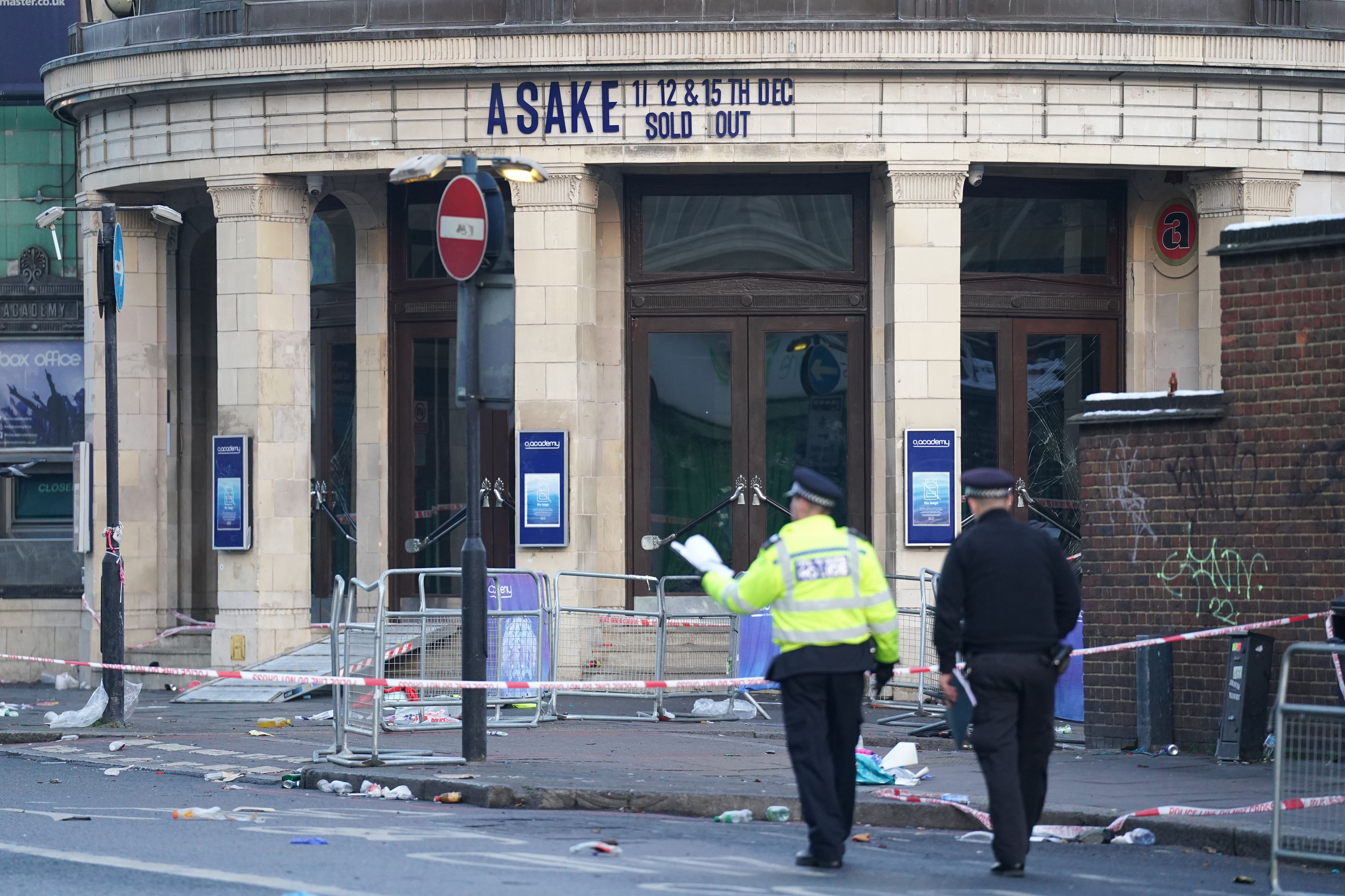 Police officers outside Brixton O2 Academy, where two people died 12 months ago (Kirsty O’Connor/PA)