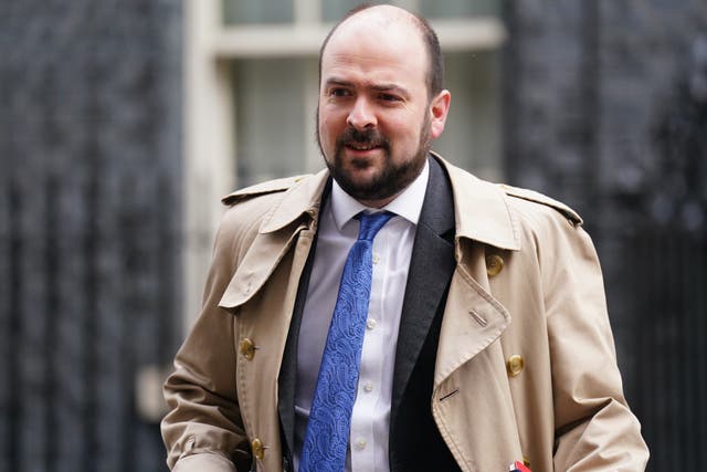 <p>Conservative Party chair Richard Holden leaves Downing Street, London, following a Cabinet meeting (James Manning/PA)</p>