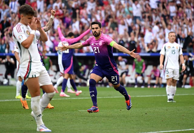 <p>Ilkay Gundogan celebrates after scoring Germany’s second goal</p>