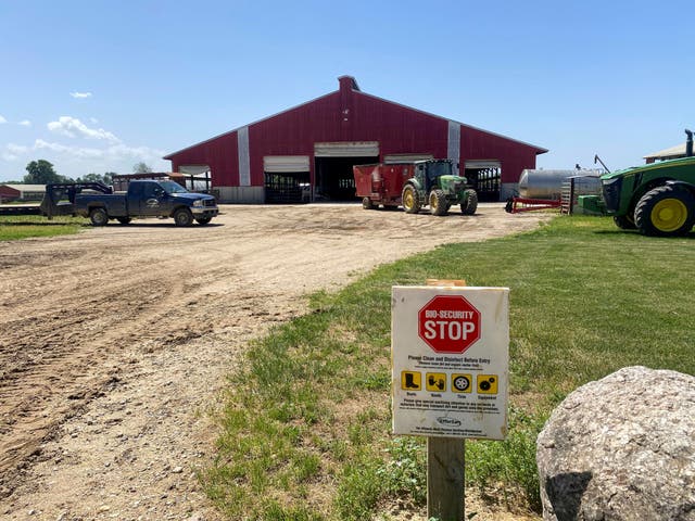 <p>A warning sign stands at a dairy farm in Martin, Michigan, last June. Michigan officials announced the state’s first outbreak since early September last week. Human cases of bird flu are now in six states  </p>