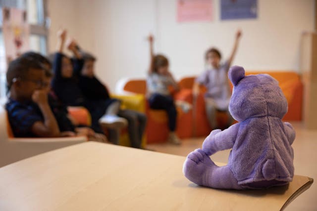 <p>Children take part in an empathy course in a nursery school, as part of the experimentation of the application of the Danish method of combating school bullying</p>