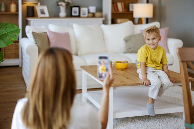 <p>Concerns have been raised about children’s welfare as mothers profit handsomely from filming them for social media</p>