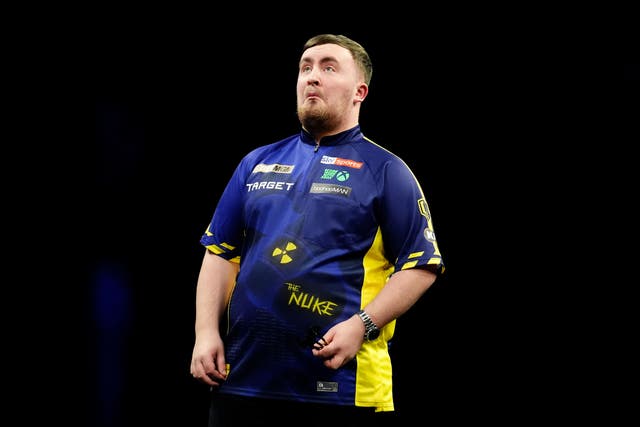 Luke Littler does not want crowd whistling to be part of the sport (Andrew Milligan/PA)