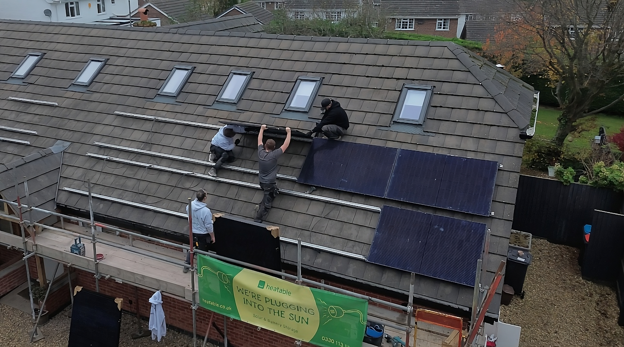 Panels are fitted on rails to the roof