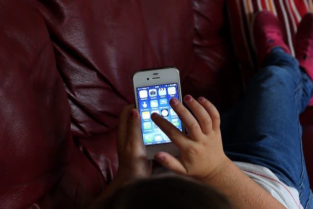 MP Josh MacAlister said children are ‘moving less, smiling less, learning less’ as a result of increased smartphone and social media use (Peter Byrne/PA)