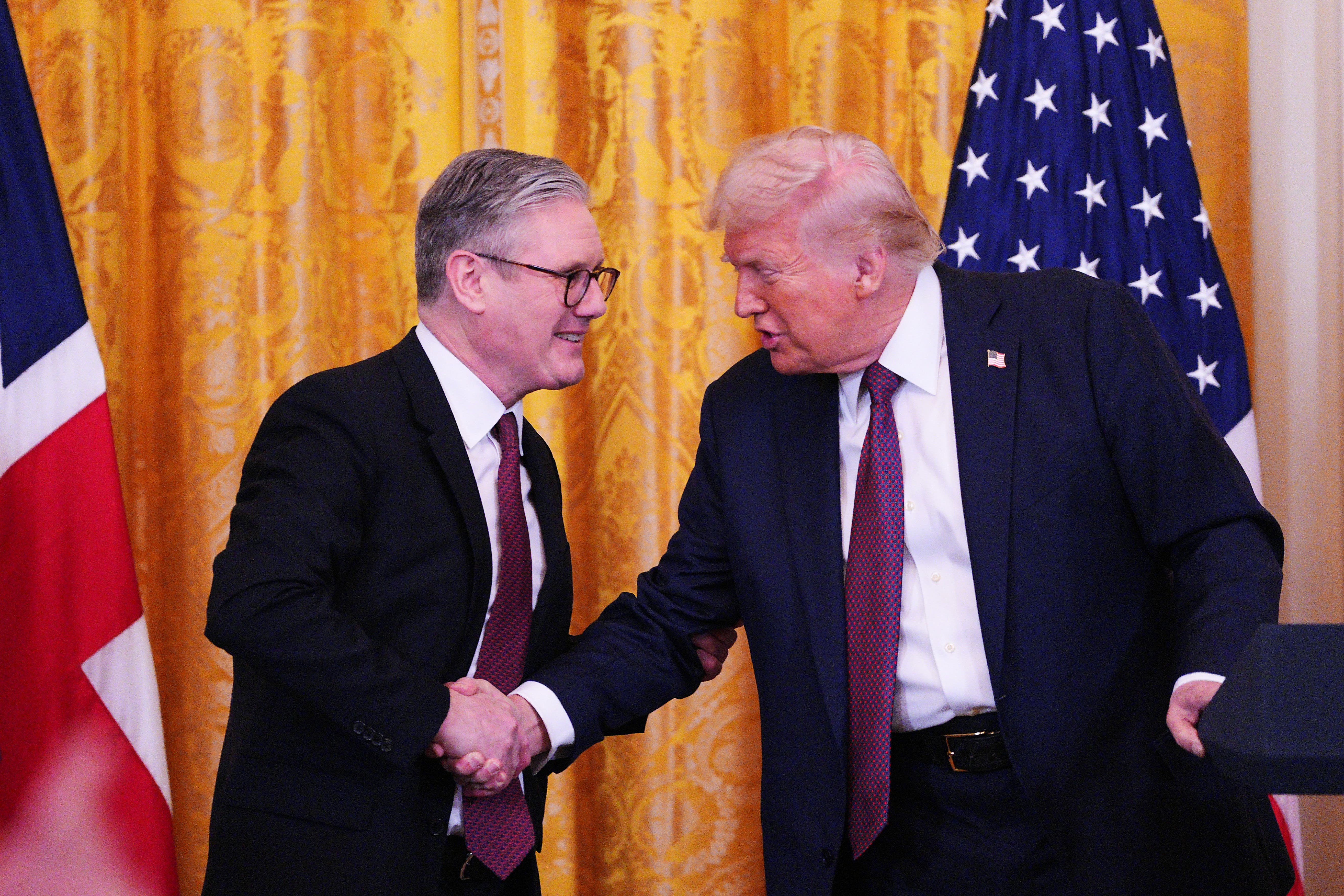 Donald Trump has launched a fresh wave of tariffs, including a 10 per cent duty on all British exports to the US (Carl Court/PA)