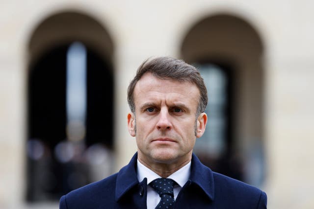 <p>French president Emmanuel Macron attends an official welcome ceremony for Uzbekistan president Shavkat Mirziyoyev at the Invalides monument in Paris</p>