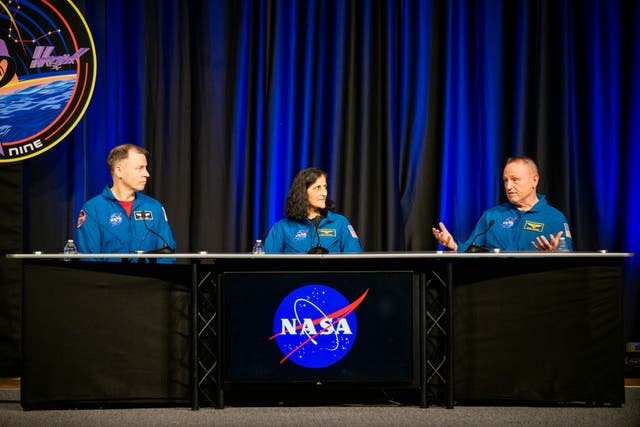 <p>Astronauts Nick Hague, Sunita Williams and Barry Wilmore speak during a news conference at the Nasa Johnson Space Center on 31 March 2025 in Houston, Texas, US</p>