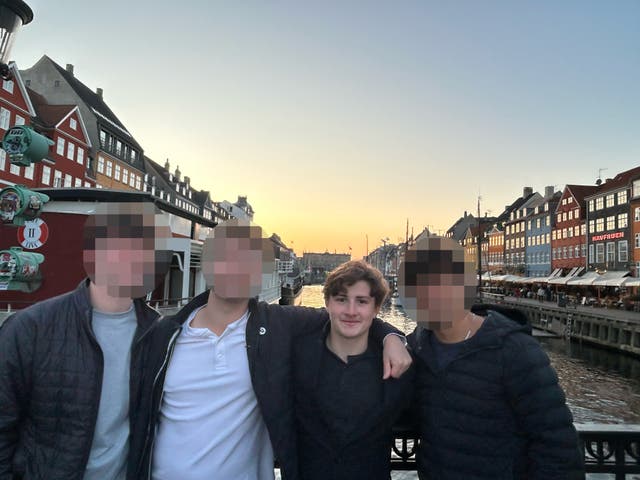 <p>Owen Ray, 19, (second from right) was arrested and detained with a friend on April 1. They have now been released but are barred from leaving Denmark</p>