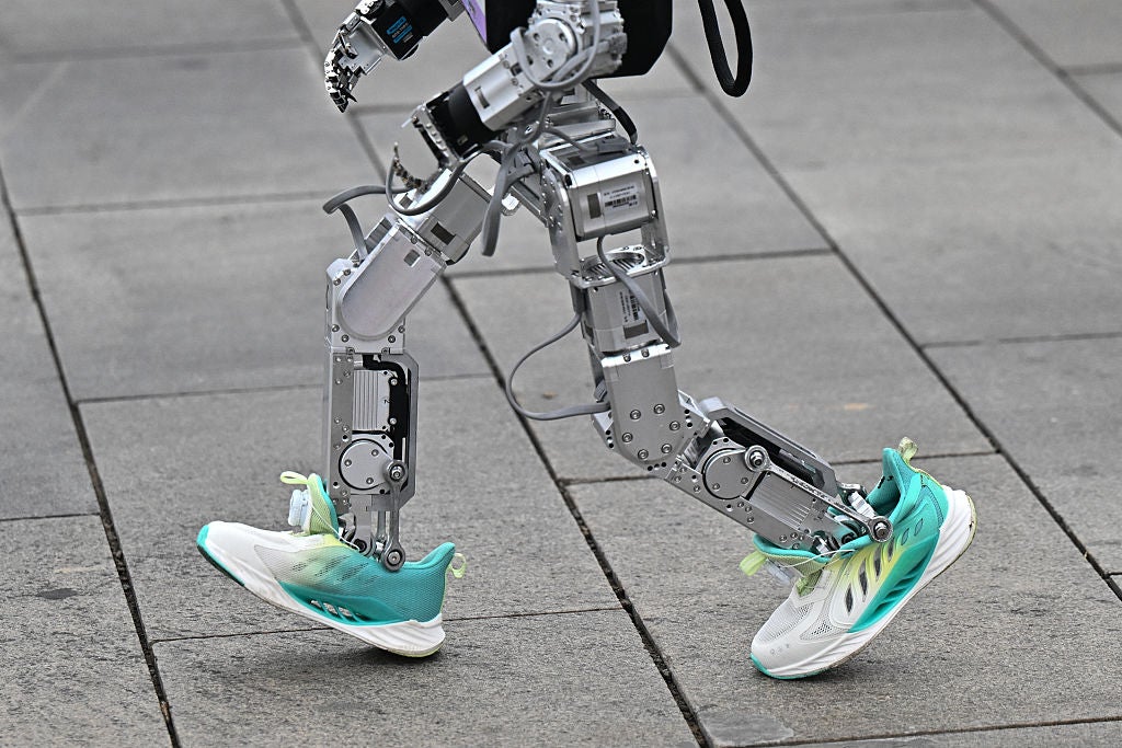 A robot runs in the humanoid robot half marathon in Beijing