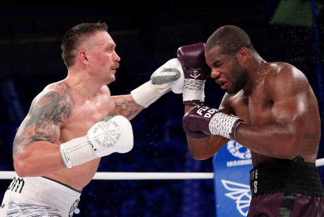 <p>Oleksandr Usyk (left) and Daniel Dubois during their 2023 clash</p>