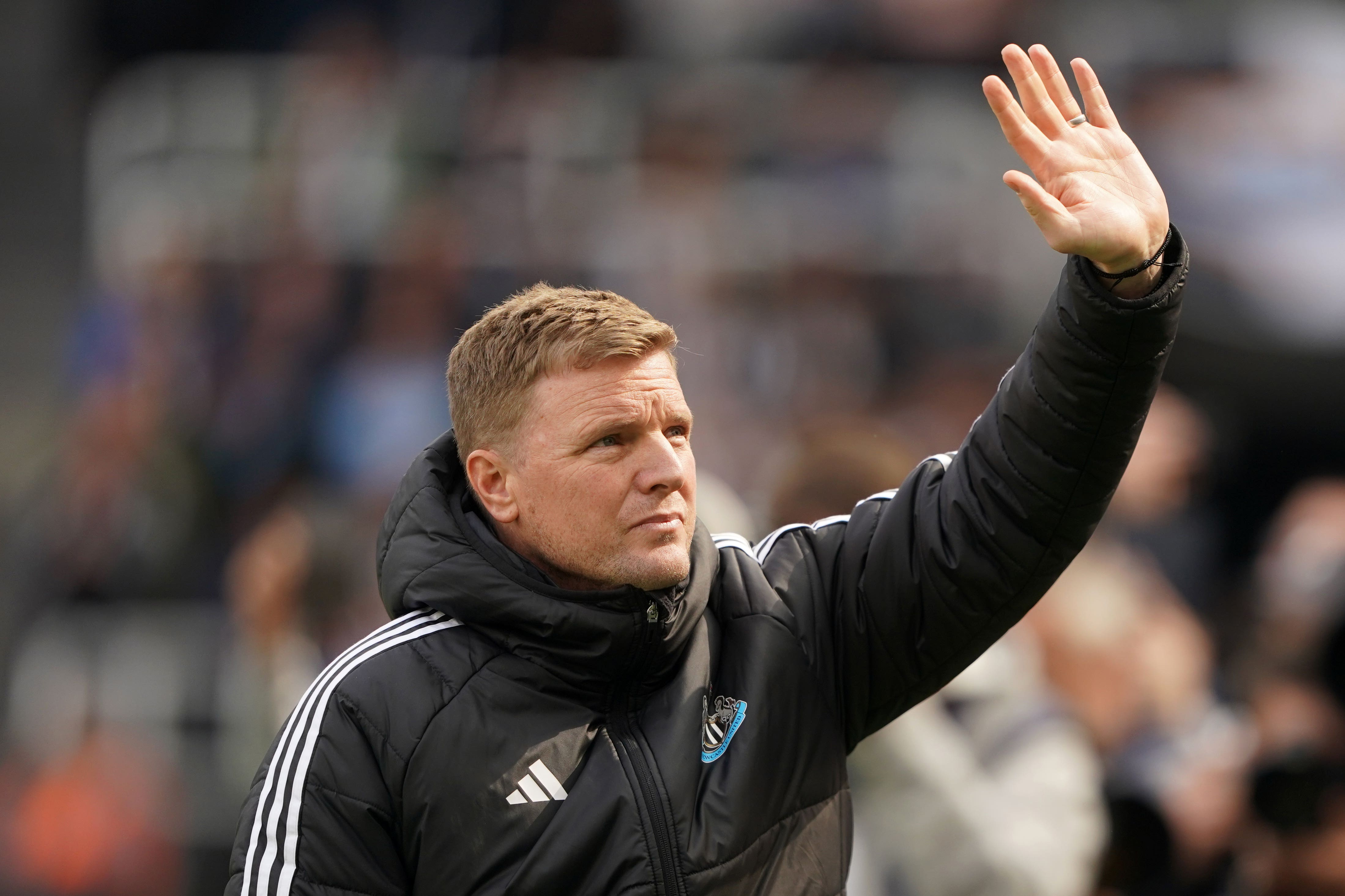 Newcastle manager Eddie Howe waves to the fans upon his return to the touchline against Ipswich (Owen Humphreys/PA)