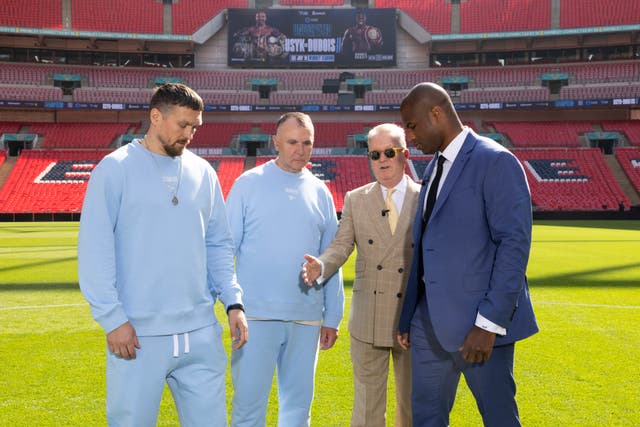 <p>Left to right: Oleksandr Usyk, promoters Egis Klimas and Frank Warren, and Daniel Dubois</p>