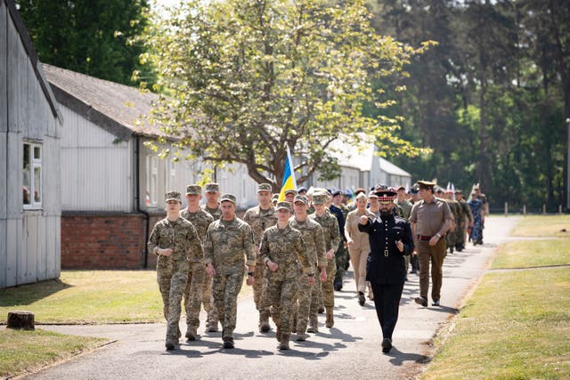 <p>Members of the Ukrainian armed forces taking part in a procession rehearsal ahead of VE Day</p>