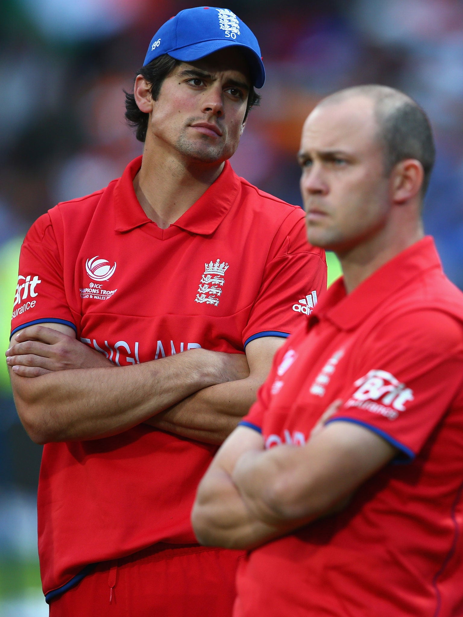 Alastair Cook and Jonathan Trott look dejected as India shine