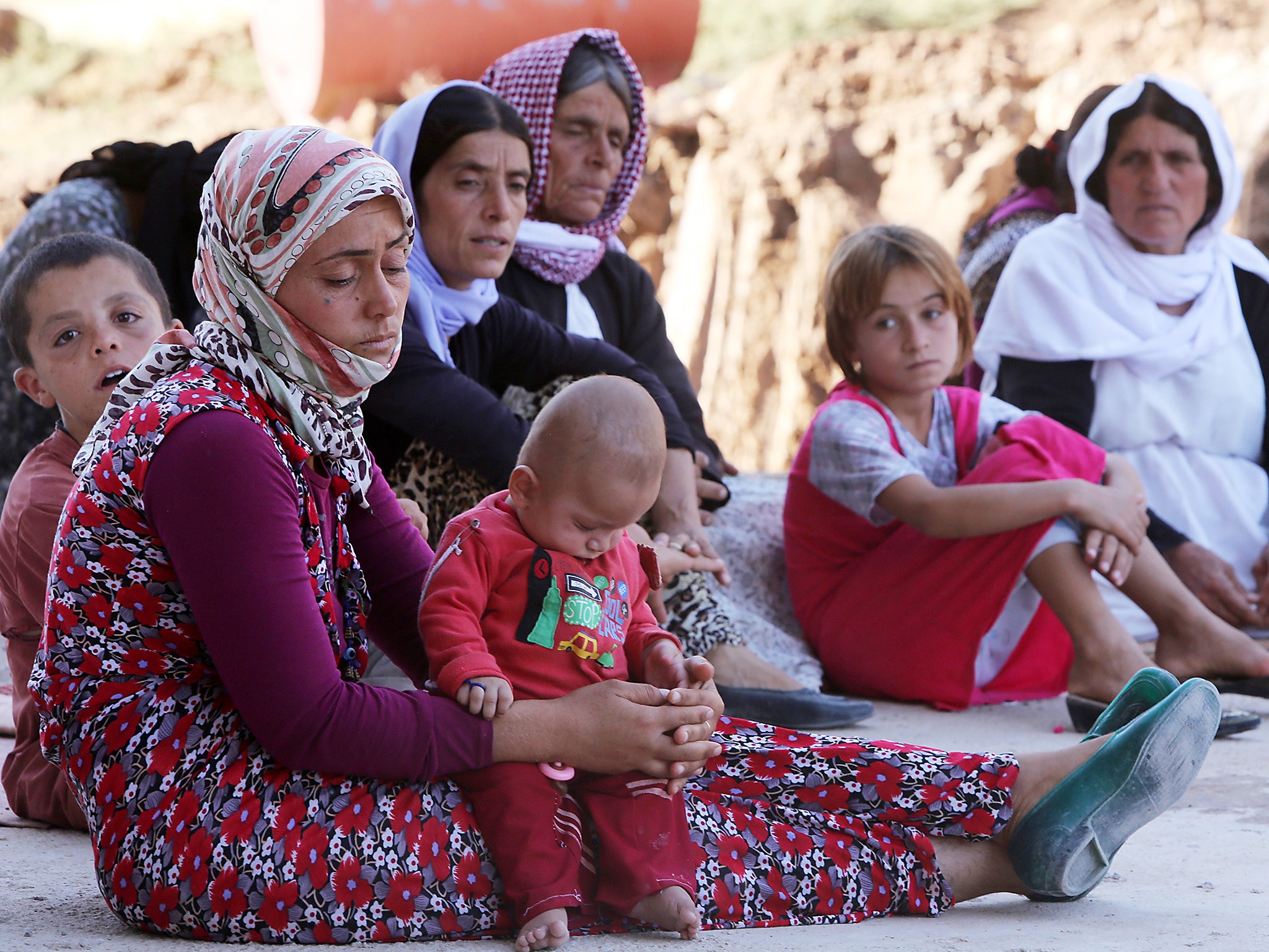 Iraqi Yazidi women and children rescued from Isis by Kurdish Peshmerga forces (Getty)