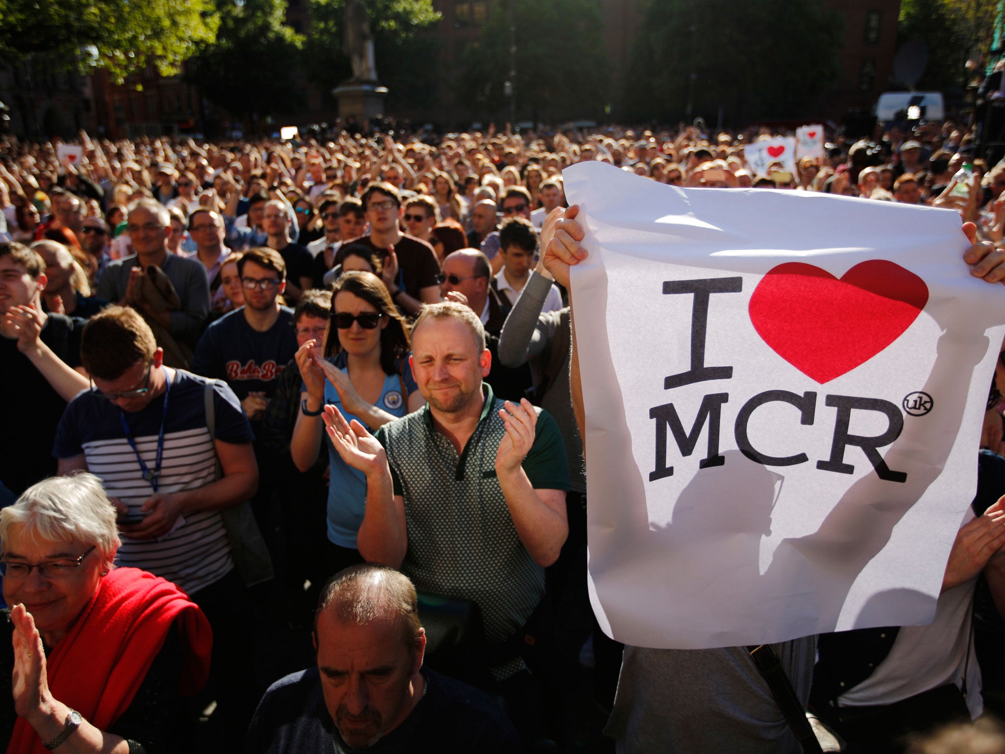 Crowds gather for a vigil in Albert Square, Manchester. If political campaigning had continued this week, it would have been respectful and muted – rendering an artificial 'truce' pointless