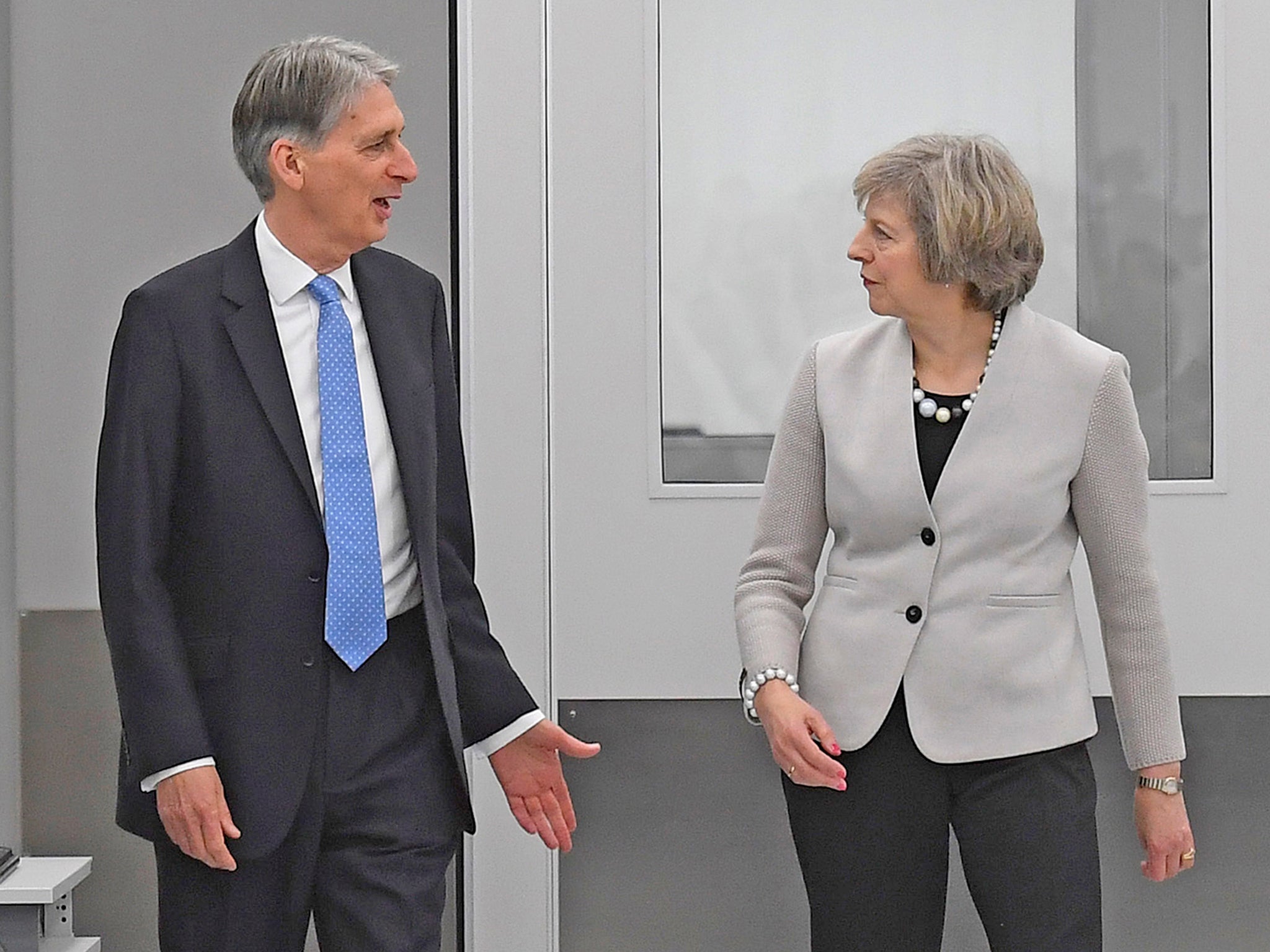 
Cabinet tensions were on display when Philip Hammond made clear he wanted a longer transition period than David Davis to ensure a smooth EU withdrawal (PA) 