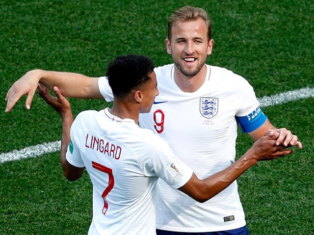 Harry Kane of England (R) celebrates with  (L) Jesse Lingard of England scoring