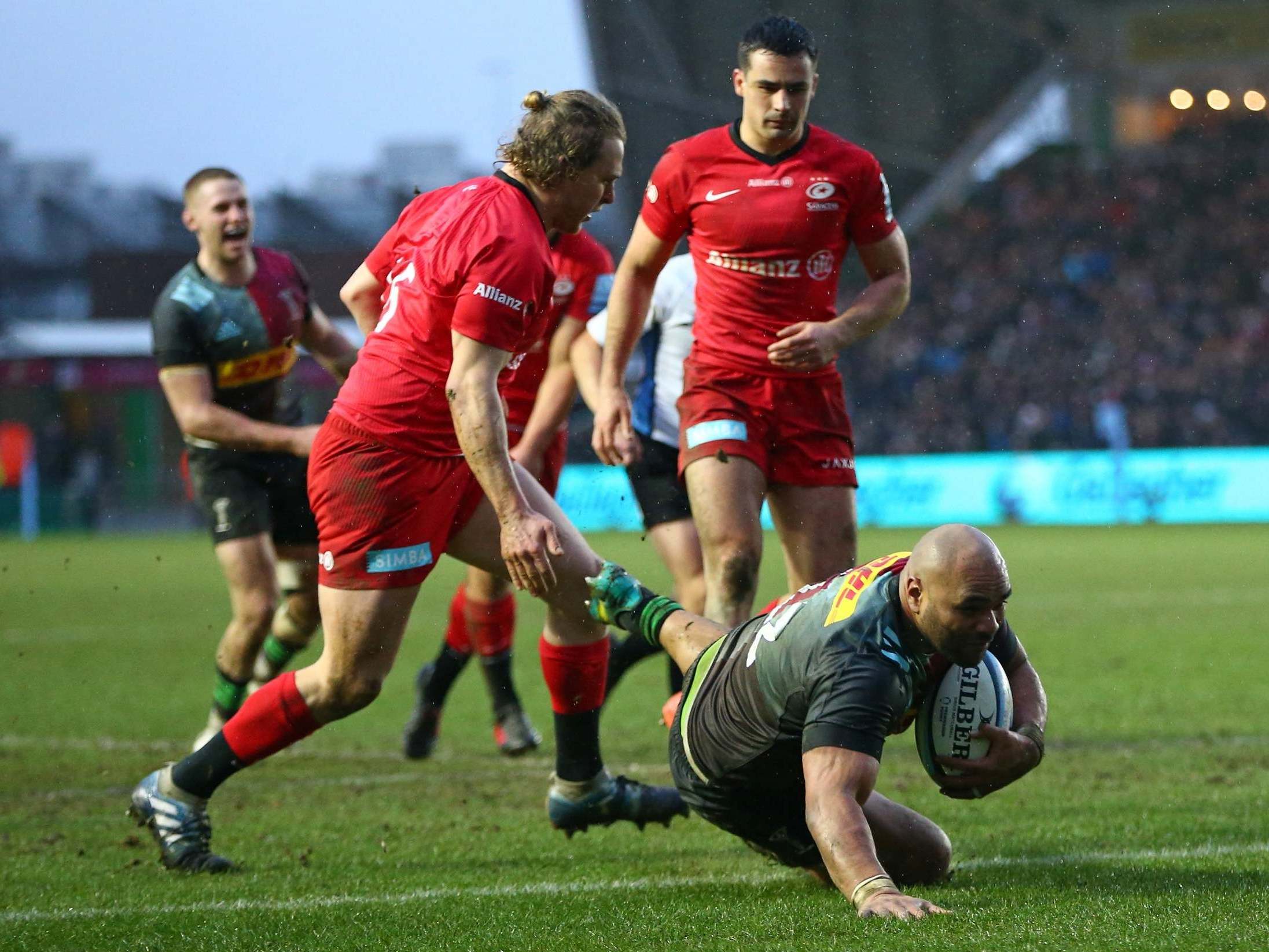 Paul Lasike crosses the tryline for Harlequins